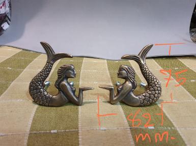 Mermaid brass handle Item Code MM02 price/set size wide 82 mm.high 77 mm. Mermaid brass handle Item Code MM02 price/set size wide 82 mm.high 77 mm.