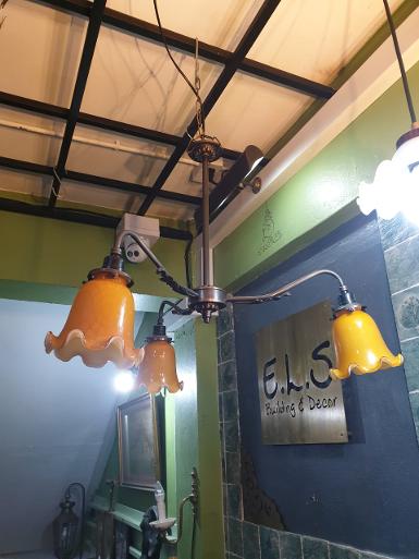 Hanging Lamp brass with yellow shade 3 light Item code HGL3L size wide 620 mm high 500 mm. Hanging Lamp brass with yellow shade 3 light Item code HGL3L size wide 620 mm high 500 mm.